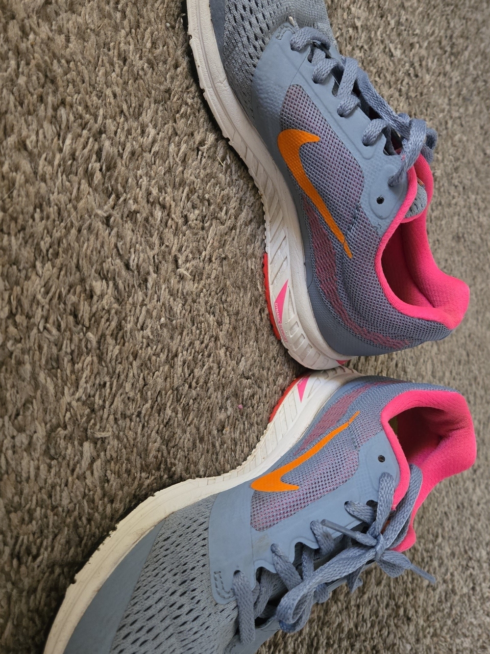 Nike Women's Light Blue Running Sneakers with Pink Lining and Orange Swoosh